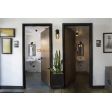 Industrial Guard Sconce, 100-Black Finish, NS-No Shade, CGG-Standard Cast Guard, CLR-Clear Glass | Photo Courtesy of Ulele Restaurant (Tampa, FL)