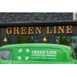 (2) 10” Wilcox, 997-Natural Raw Brass, G15 Gooseneck Arm in 100-Black, Cast Guard in 100-Black with Clear Glass | Photo Courtesy of Green Line Apothecary and Lineage Corporation