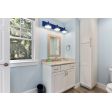 Austin Triple Straight Arm Vanity Light, 700-Royal Blue, 8” Wire Cages in 975-Galvanized | Courtesy of Coastal Custom Home Builders