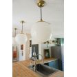 12” Glass Ball Pendant, Opaque Glass, 997-Raw Brass Top & Canopy, SBK-Standard Black Cord | Photo Courtesy of Jesse Bray (@jessbrayy)