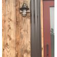 Industrial Guard LED Sconce, 600-Bronze, CGG-Standard Cast Guard in 615-Oil Rubbed Bronze, Ribbed Glass, Dusk-to-Dawn Photocell, 16W LED - 1600 Lumen, 2700K Color Temperature  | Photo Courtesy of Jay Nicolas @nicolasjay