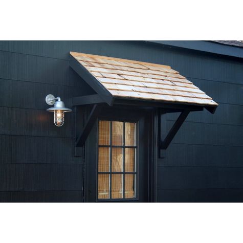 Industrial Guard Sconce, 975-Galvanized, CGG-Standard Cast Guard, CLR-Clear Glass | Photo Courtesy of Most Lovely Things