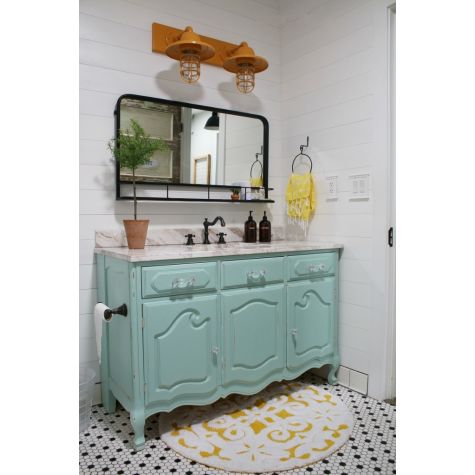 Industrial Guard Double Vanity Light, 570-Sunflower, CGG-Standard Cast Guard, CLR-Clear Glass | Photo Courtesy of Lolly Jane