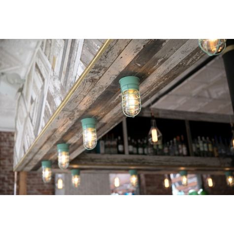 Wire Guard (Displayed Here: Flush Mount Guard Sconce, 311-Jadite, WGG-Wire Guard, CLR-Clear Glass | Courtesy of The Garden Table)