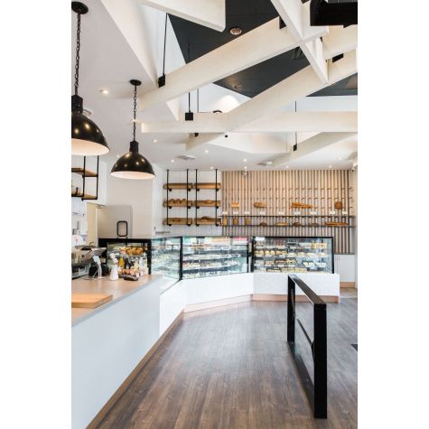20” Wilcox, 100-Black, 4 ft of Chain in 100-Black with SBK-Standard Black Cord | Photo Courtesy of Janks Design Group, Breka Bakery, Symmetry Lighting and Christine Pienaar Photography