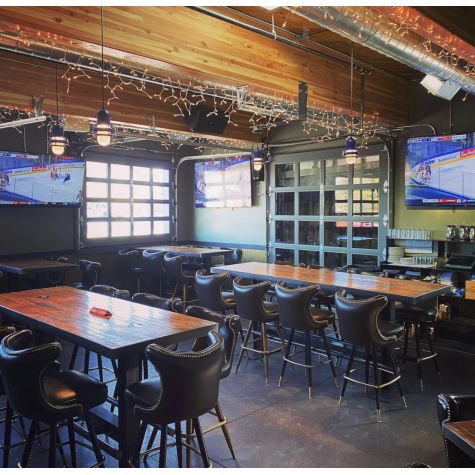 Brewster LED Pendant, 710-Cobalt Blue PTMP, Ribbed Glass, SBK-Standard Black Cord, 2700K Color Temperature | Photo Courtesy of Boneyard Saloon in Park City, Utah (@boneyardsaloon)
