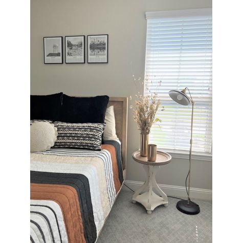 Sinclair Floor Lamp, 105-Textured Black Stem, 997-Raw Brass, SBK-Standard Black Cord, Plug Switch, 100-Black | Photo Courtesy of Homeowner