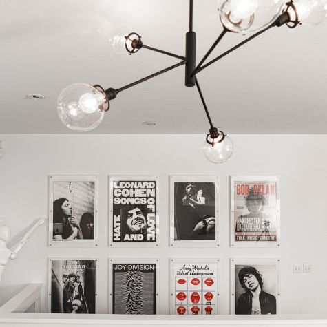 Bubble 5-Light Chandelier, Clear Glass, 105-Textured Black, 12" Stem, G30 Arm, Thread Edison Bulb | Photo Courtesy of Dion Williams Design